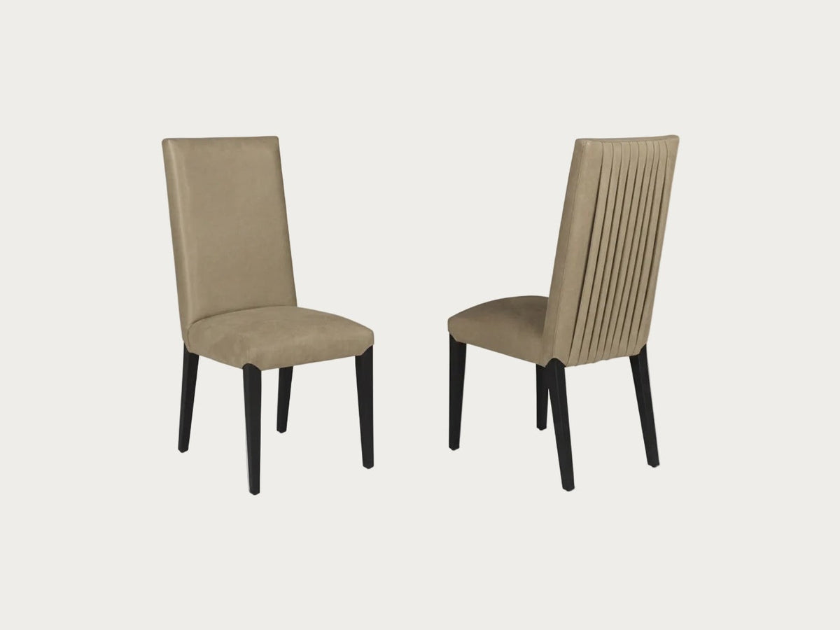 Two beige Westin dining chairs with black legs on a white background