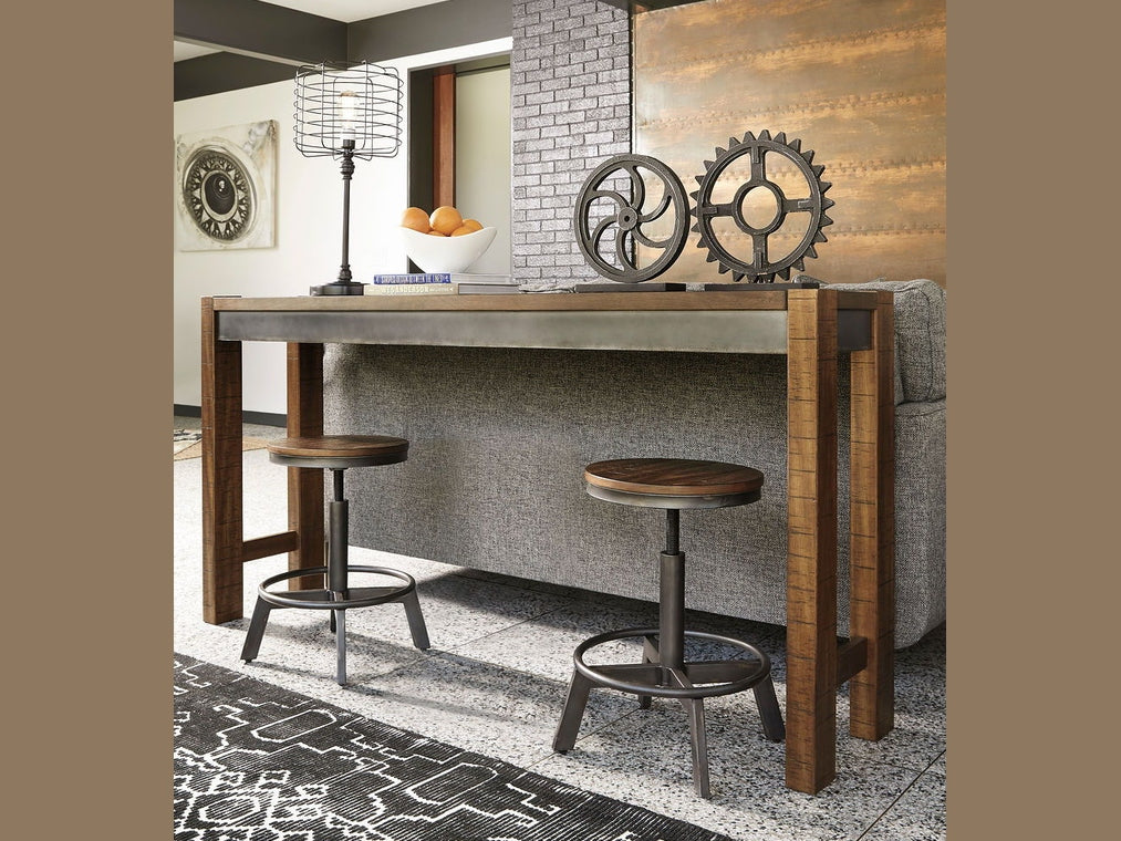 Torjin - 3 Pc. - Long Counter Table, 2 Stools - Dark Brown
