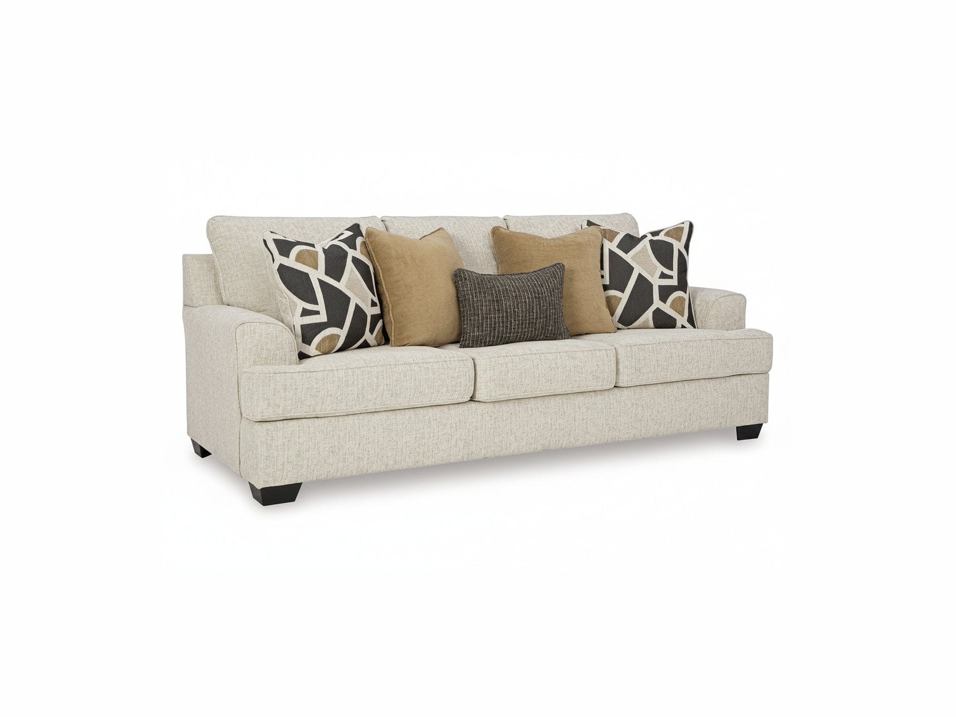 Beige sofa with patterned and solid color pillows on a white background