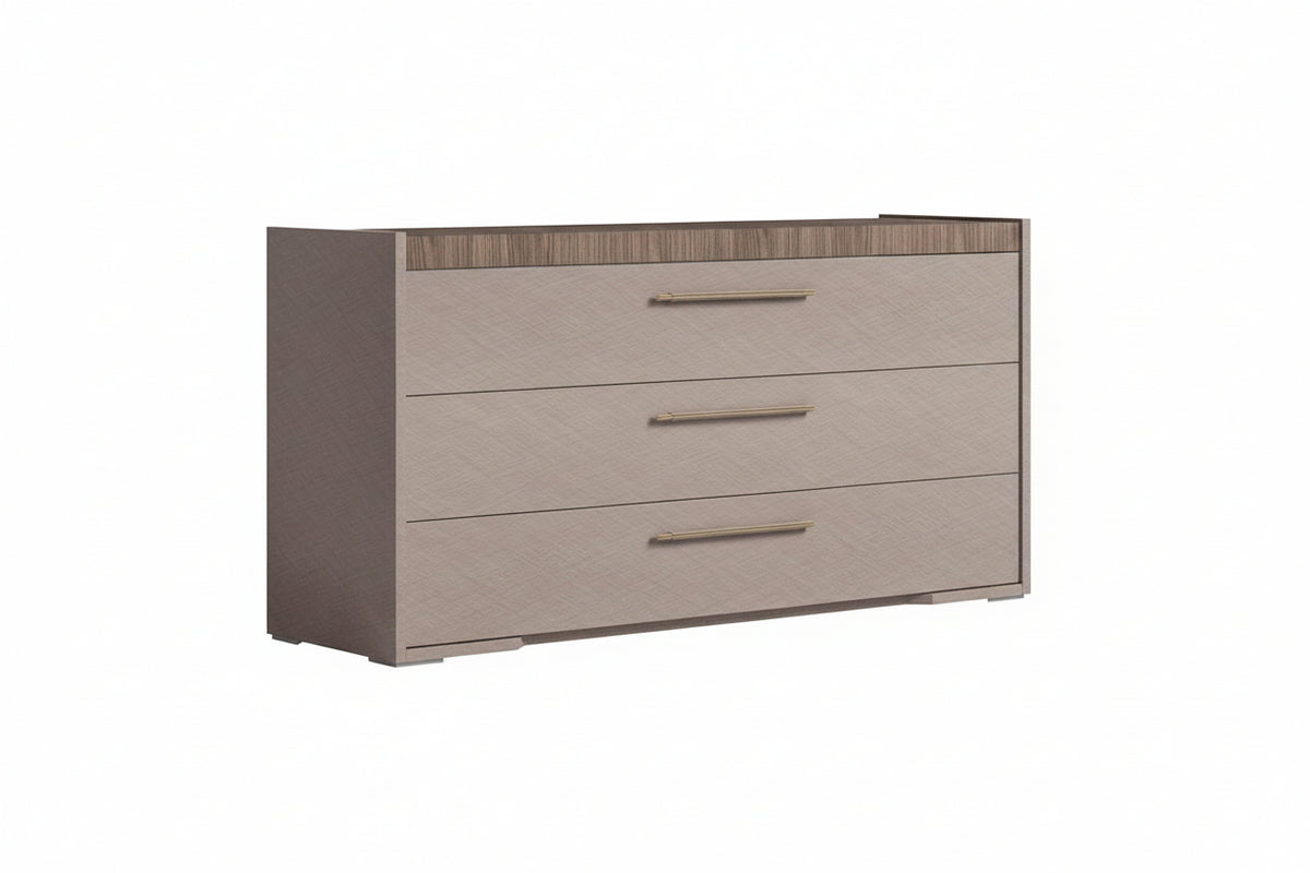 A three-drawer dresser with a light beige wood-grain finish and a darker brown top surface, shown on a plain white background.