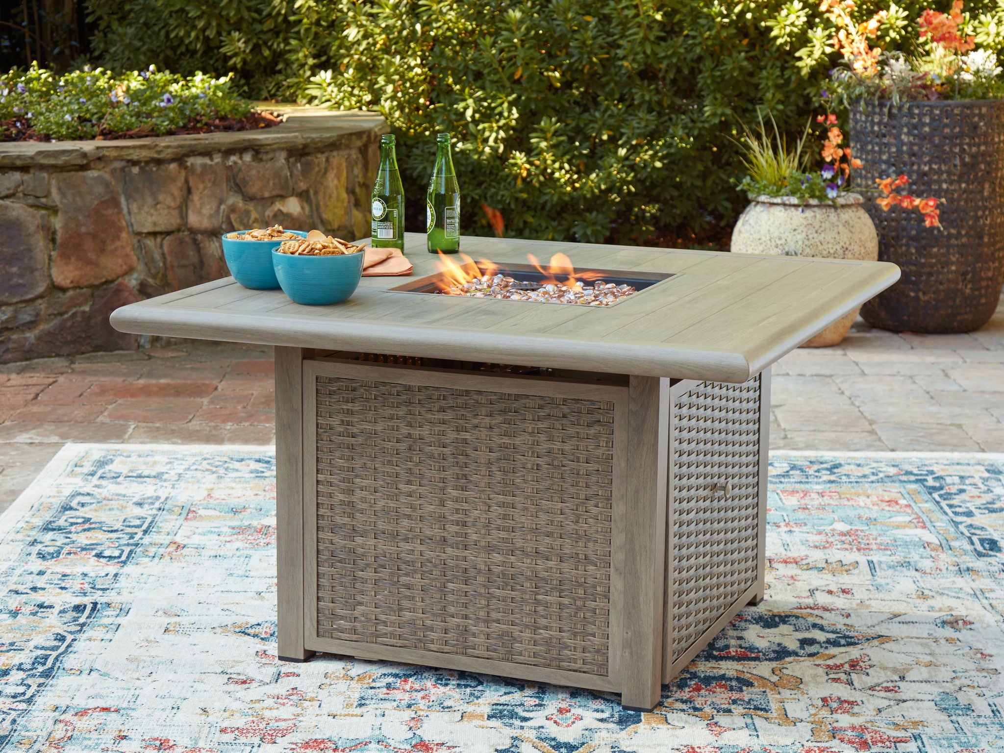 Carisbo - 5 Pc. - Fire Pit Table, 4 Rocking Chairs - Beige