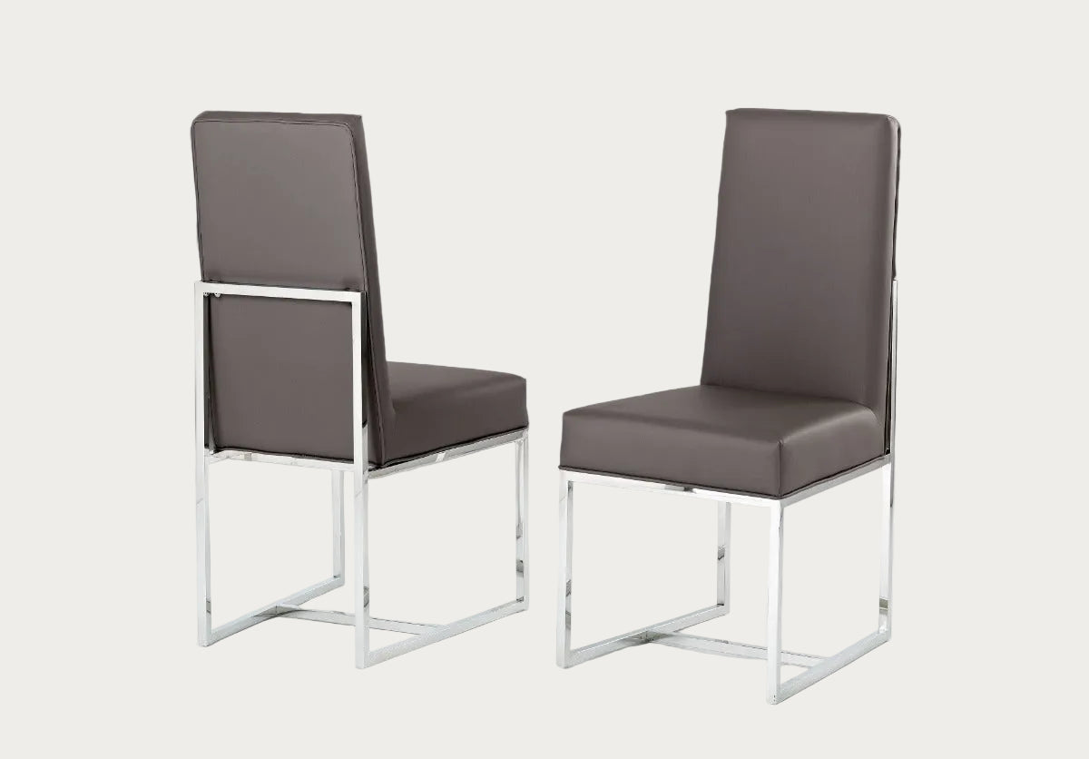 Two Bess gray chairs with metal frames on a dark background
