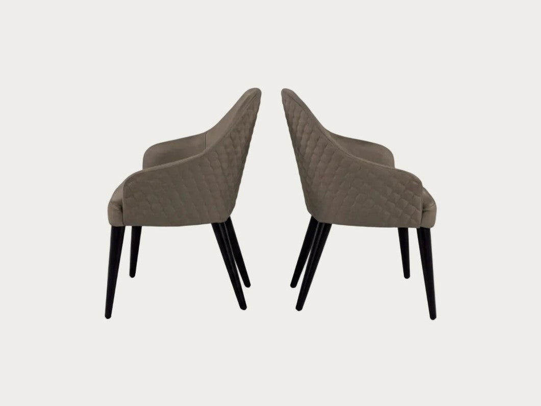 The Linda brown chairs with quilted design on a white background