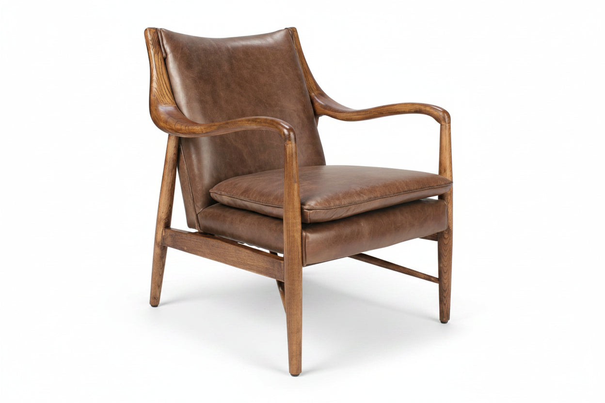 Brown leather armchair on a white background