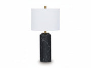 Hanzila table lamp with a black marble base and white shade on a white background.