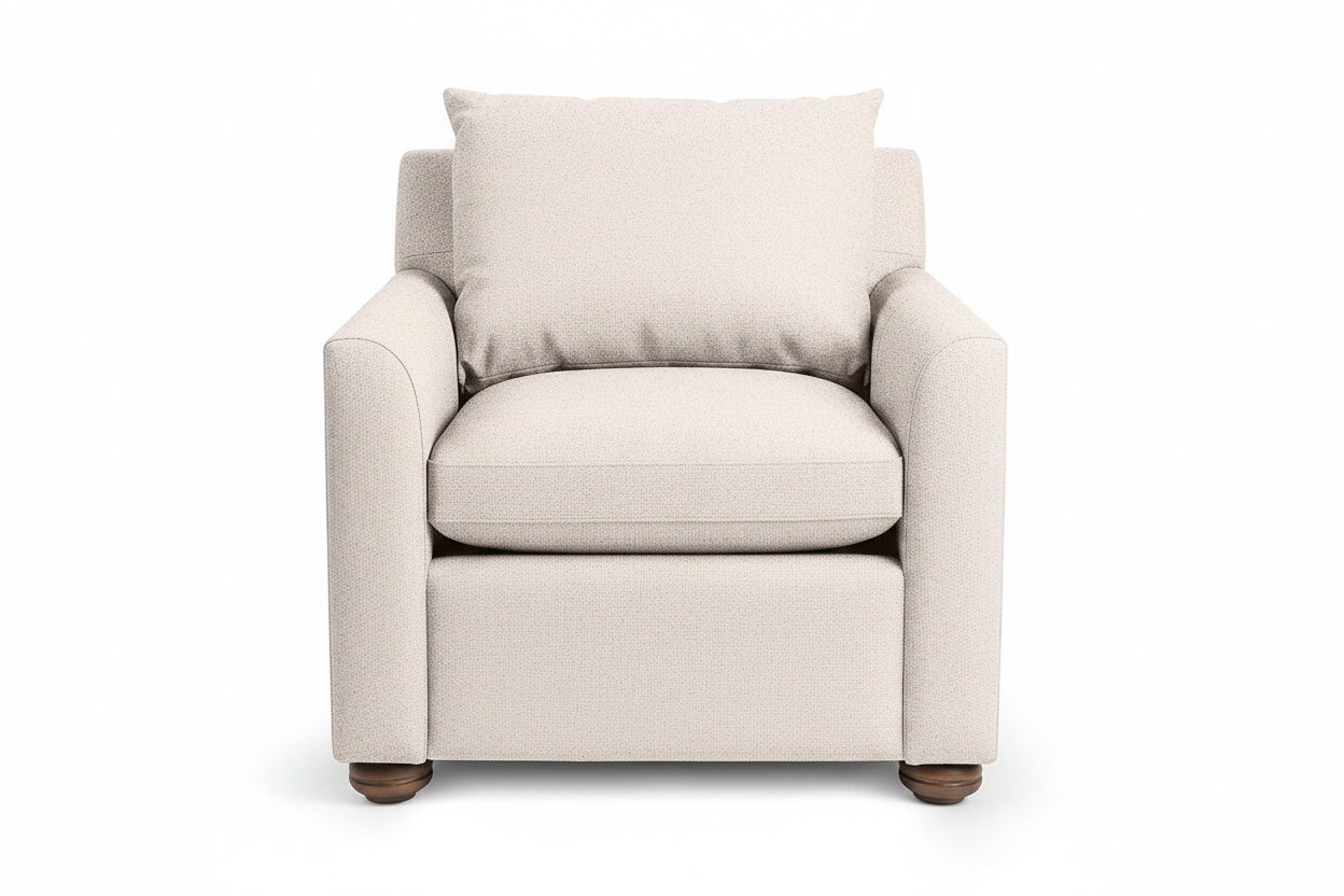 Beige armchair with a pillow on a white background