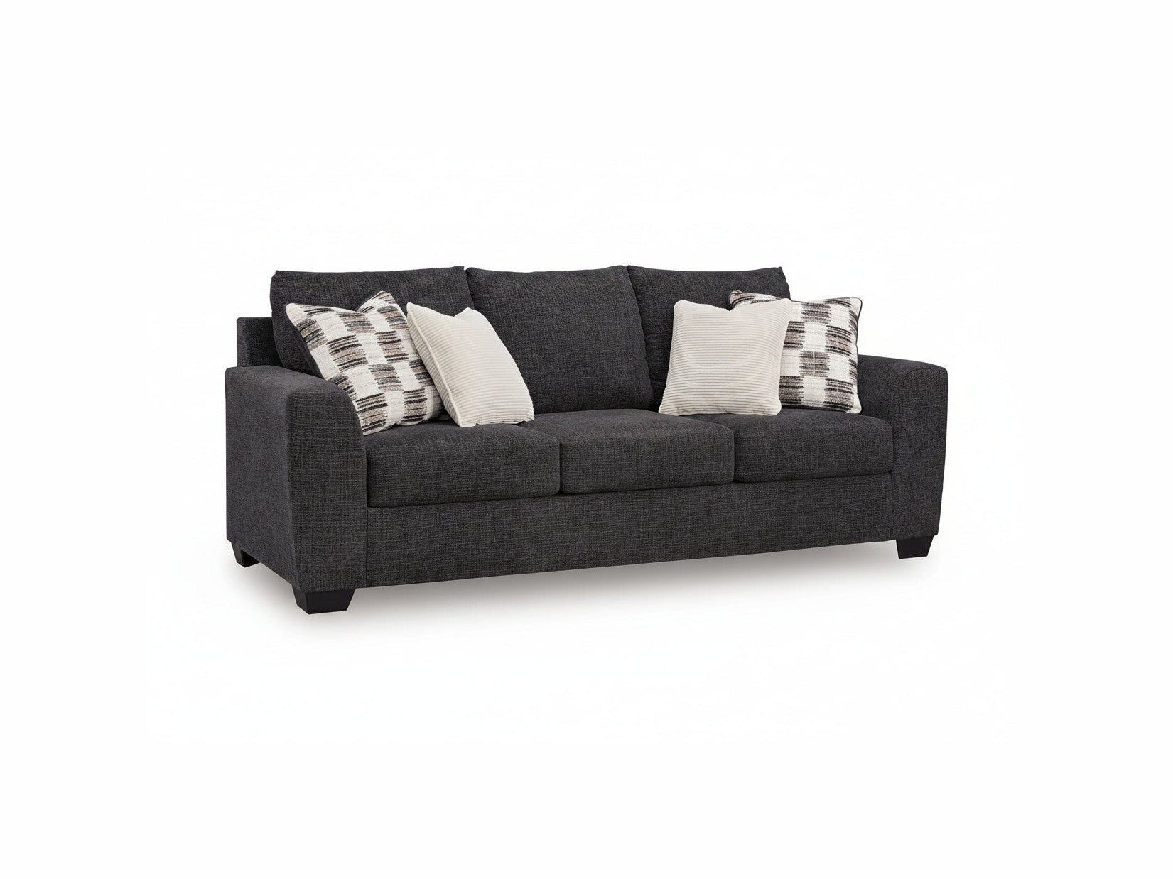 Gray sofa with patterned and plain cushions on a white background