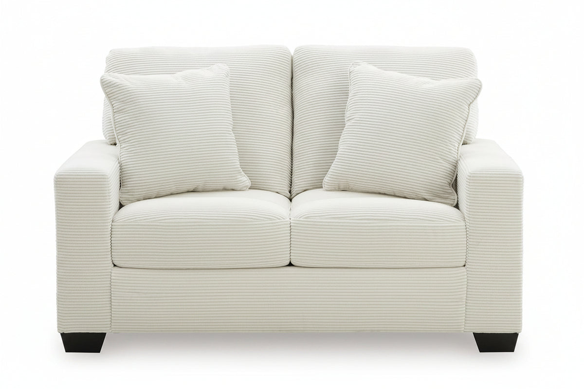 White sofa with striped cushions on a white background