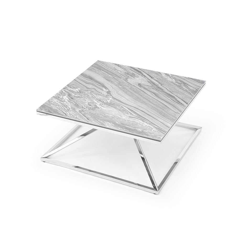 Pyramid square marble table with metallic base on a white background.