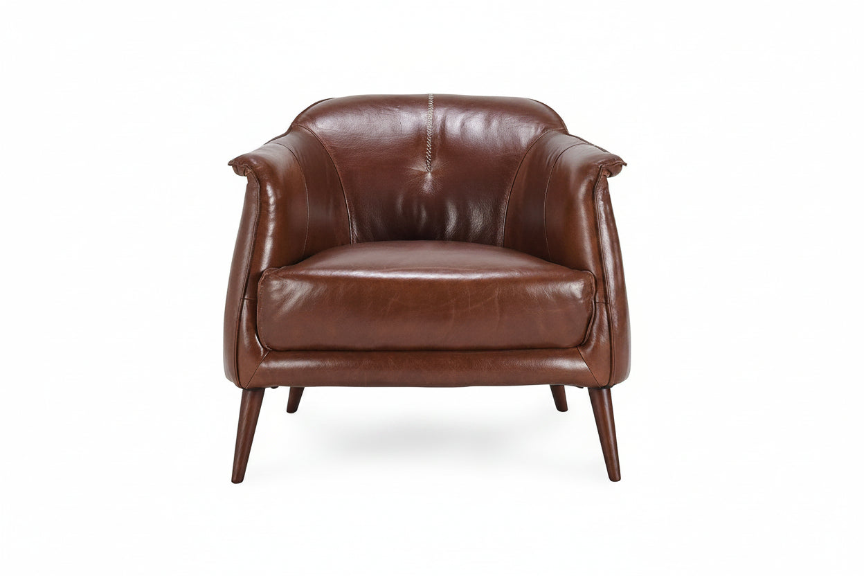 Brown leather armchair on a white background