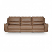 Brown leather sofa with reclining sections on a white background