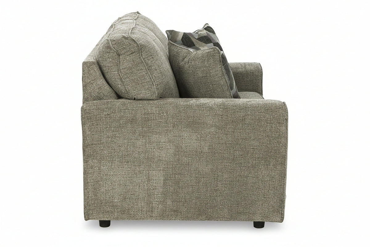 Gray upholstered chair with patterned cushions on a white background
