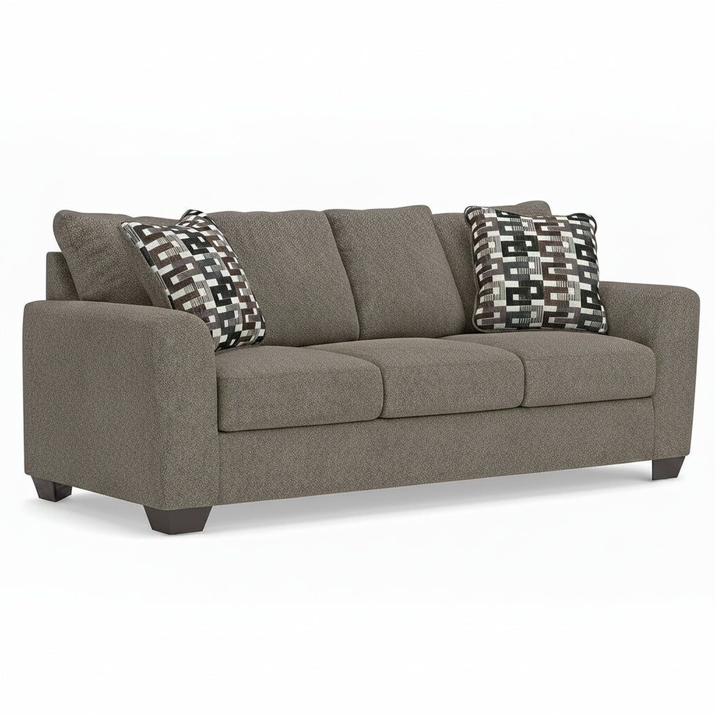 Triston light brown sofa with patterned cushions on a white background