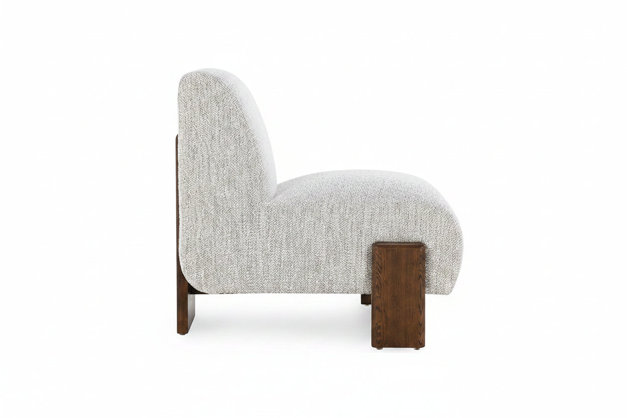 Modern chair with textured gray upholstery and wooden legs on a white background