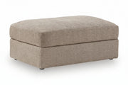 A rectangular upholstered ottoman with a lift-top design, upholstered in a textured beige fabric, shown on a white background.