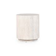 Round wooden side table with a light finish on a white background