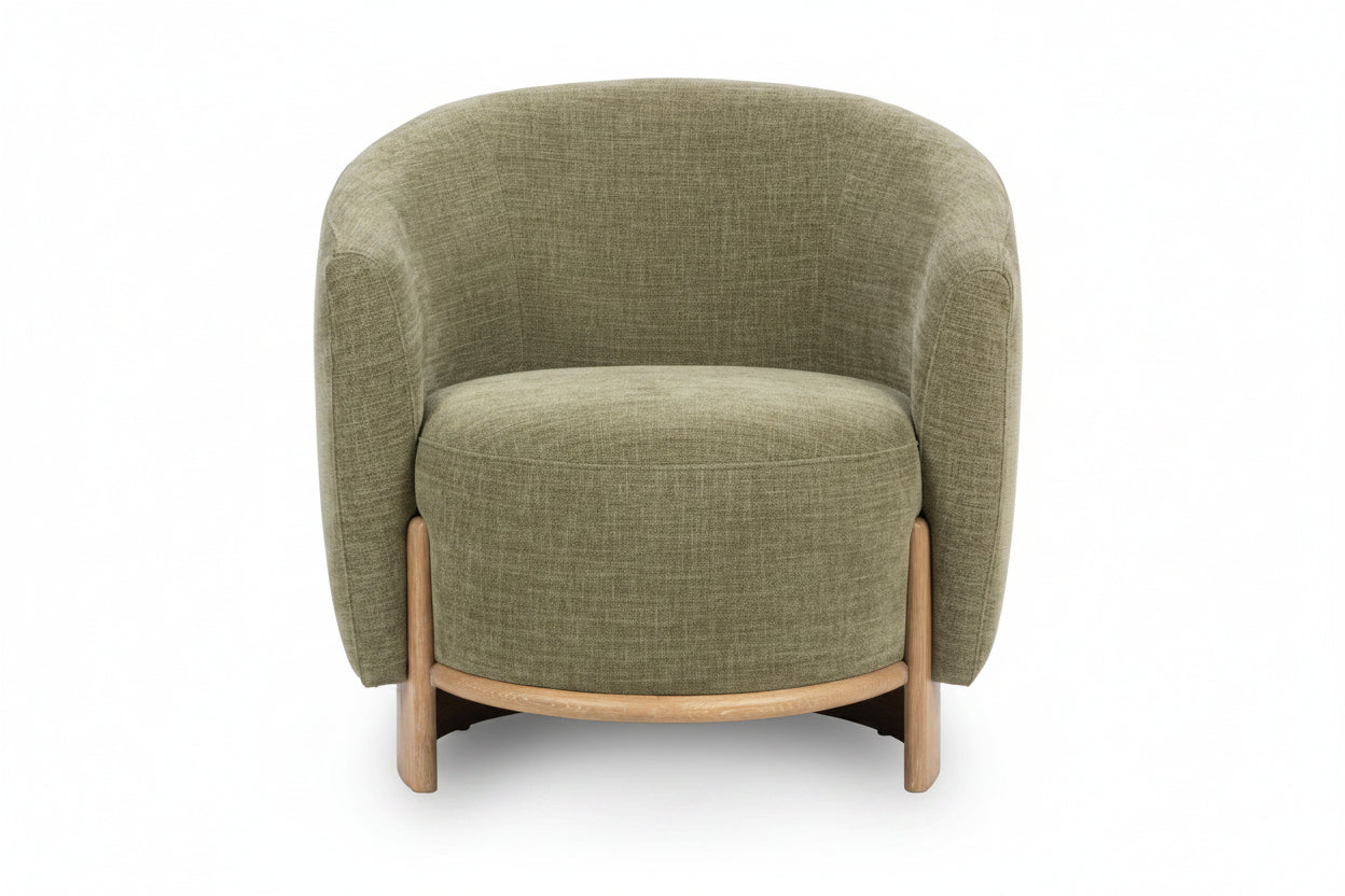 Sage dust-colored upholstered armchair with wooden legs on a white background