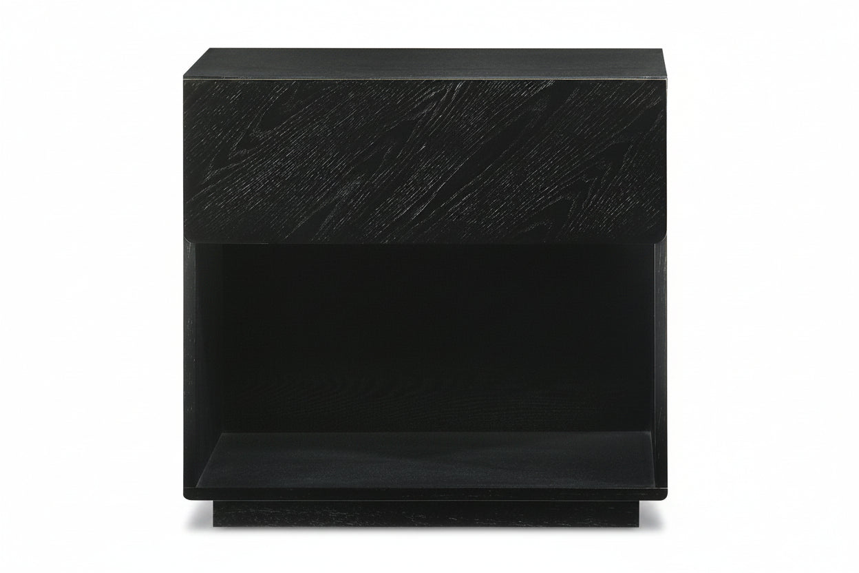 A modern black nightstand with a dark wood grain finish and an open shelf, shown against a plain white background.