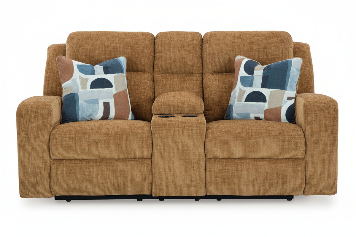 Brown sofa with patterned cushions on a white background