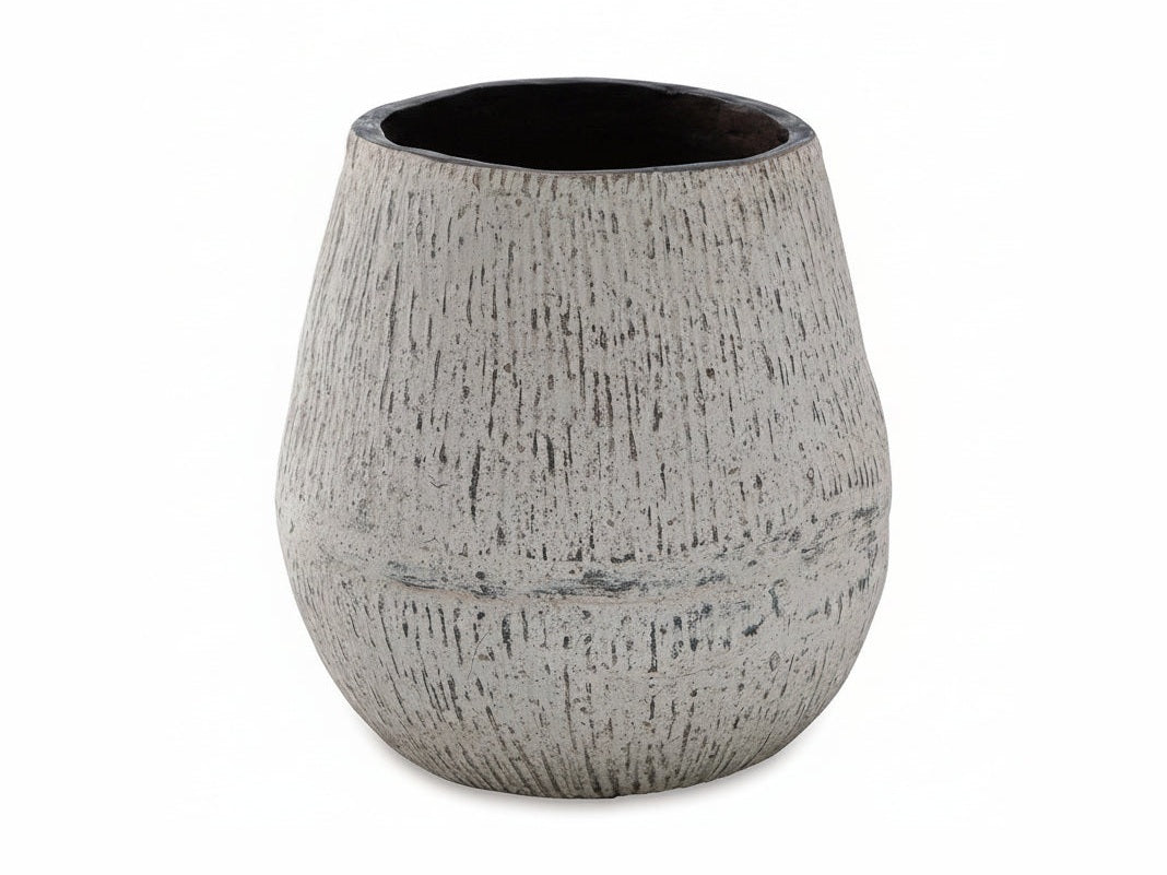 Textured gray ceramic vase on a white background