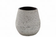Textured gray ceramic vase on a white background