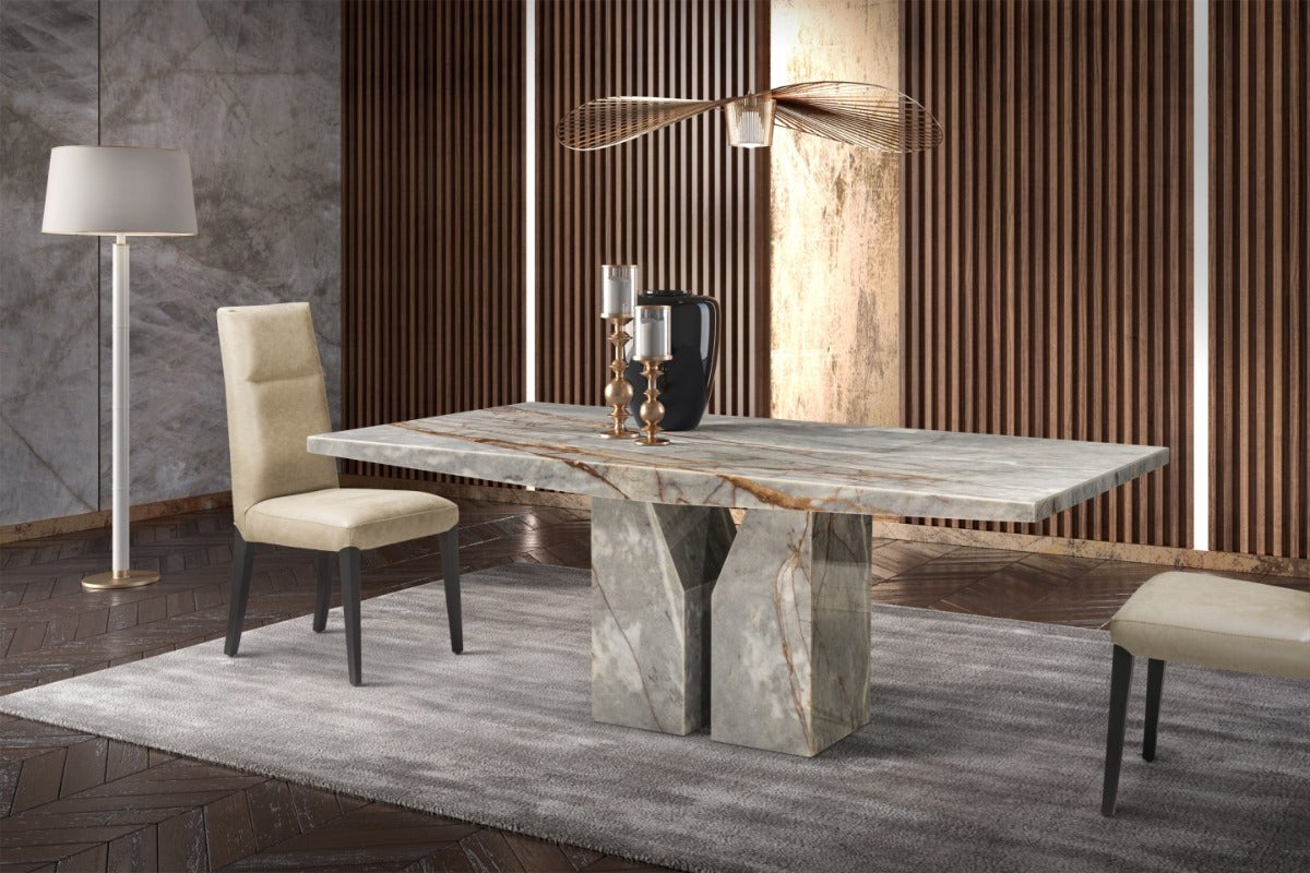Dining room with a marble table and chairs in a modern interior setting.