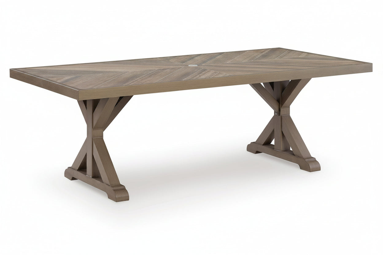 Wooden dining table with X-shaped legs on a white background