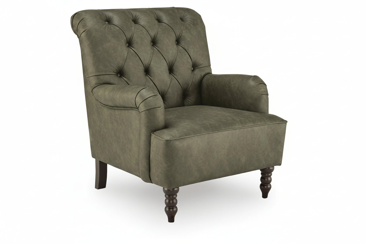 An upholstered armchair in a textured sage green fabric with button tufting on the backrest, rolled arms, and dark turned wooden legs, shown on a plain white background.