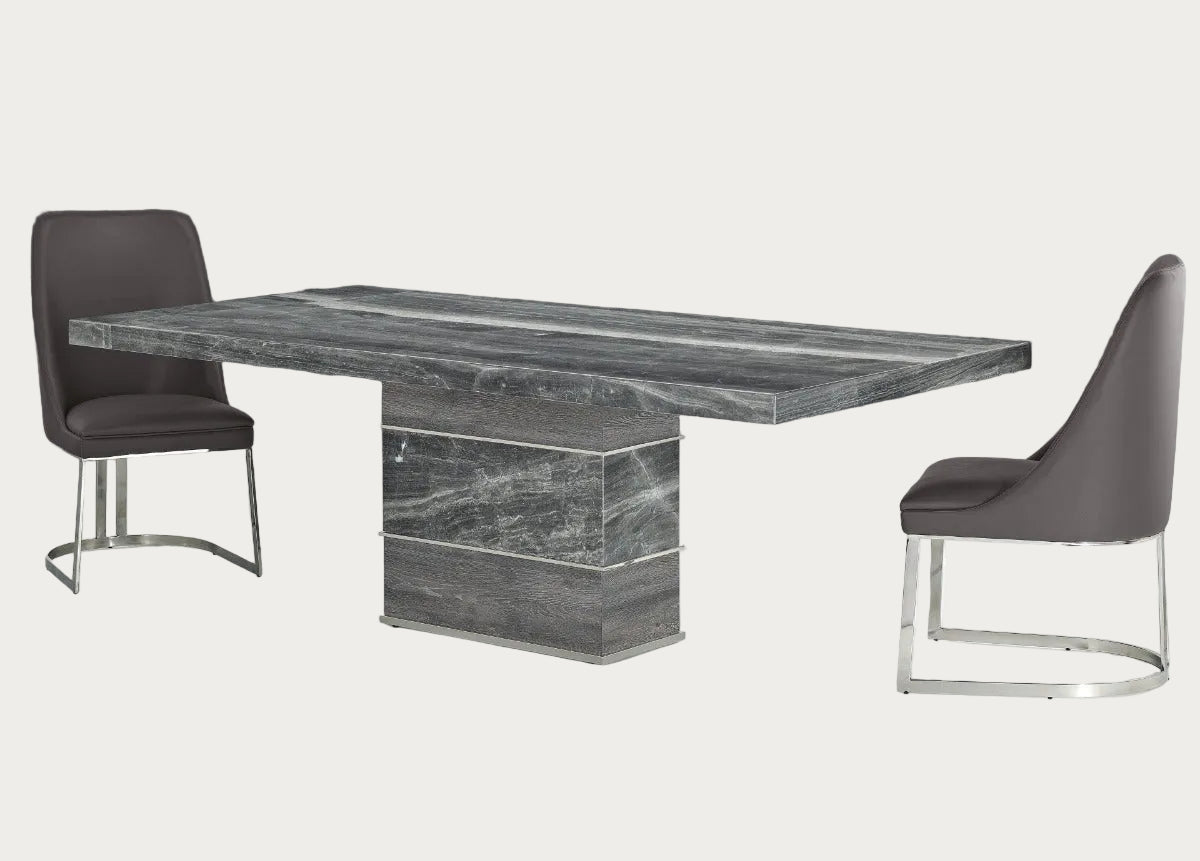 Dining table with marble finish and two matching chairs on a white background