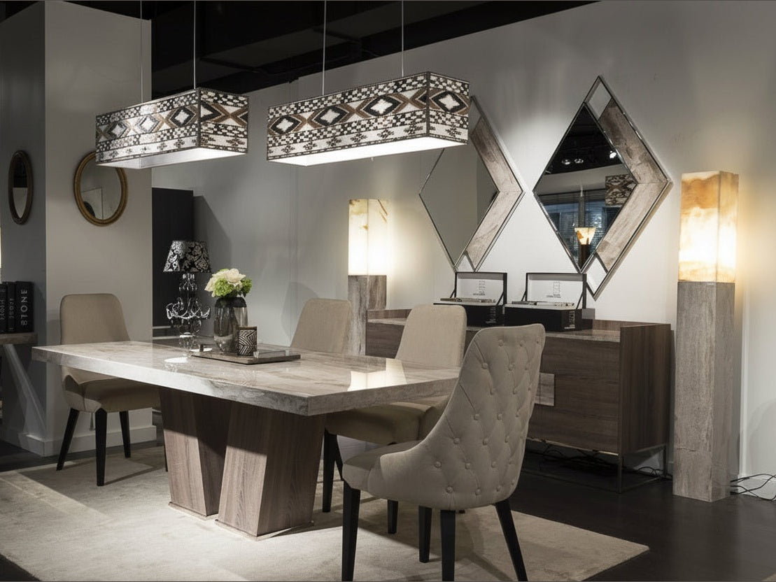 The Luna modern dining room set includes a table, chairs, and decorative mirrors.