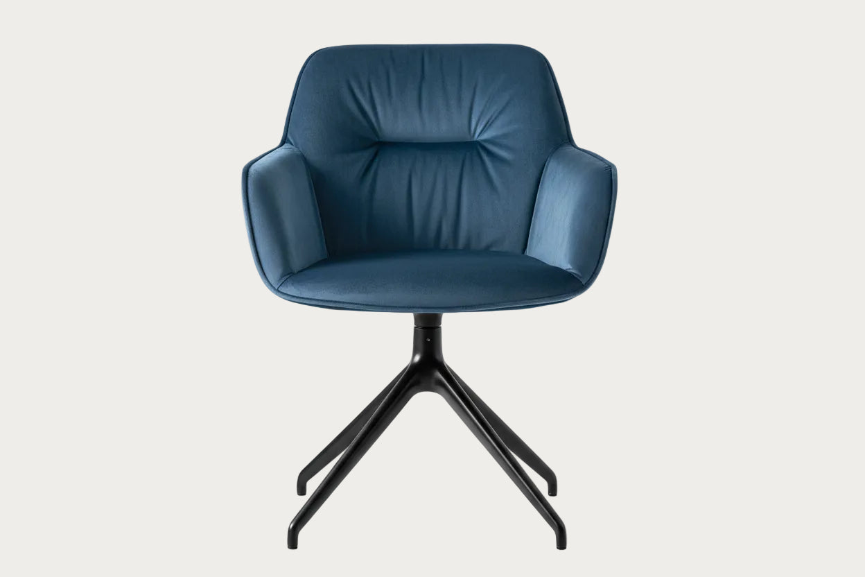 Calligaris CS2085 blue armchair with black swivel base on a white background.