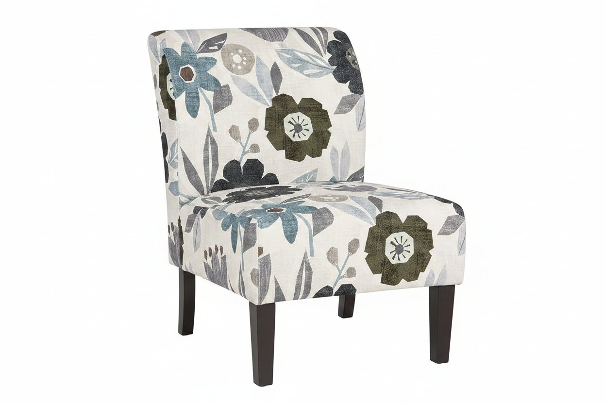 Floral patterned chair with dark wood legs on a white background