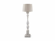 Madsbrook decorative table lamp with a textured white base and beige lampshade on a white background.