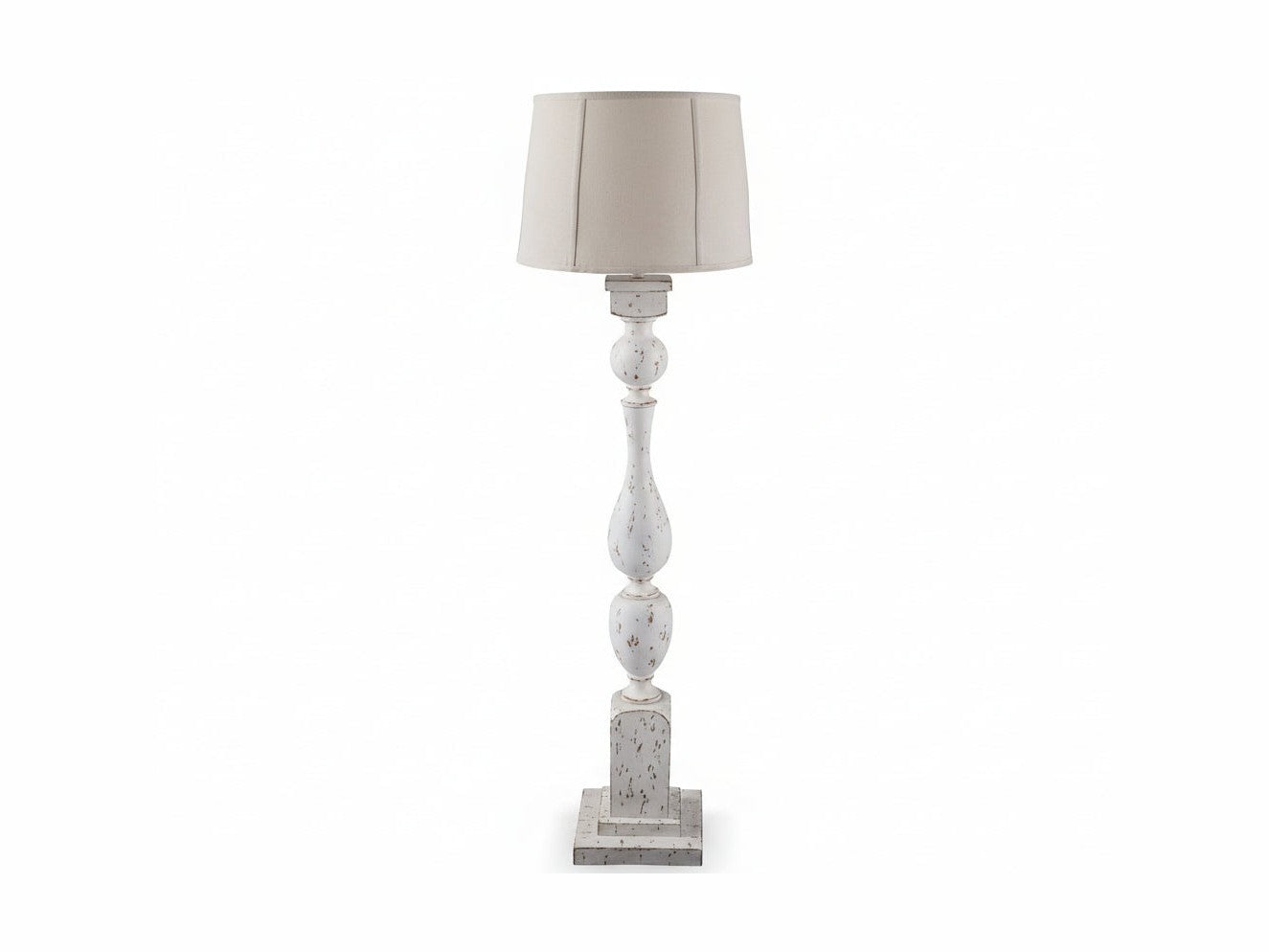 Madsbrook decorative table lamp with a textured white base and beige lampshade on a white background.