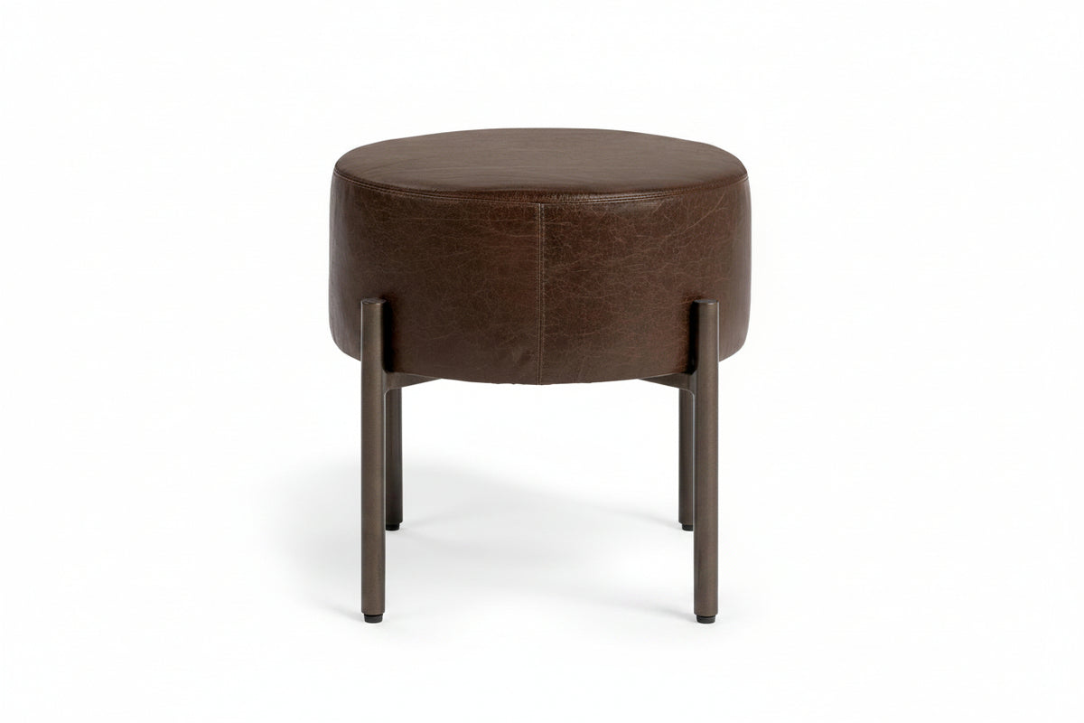 Round brown leather stool with metal legs on a white background