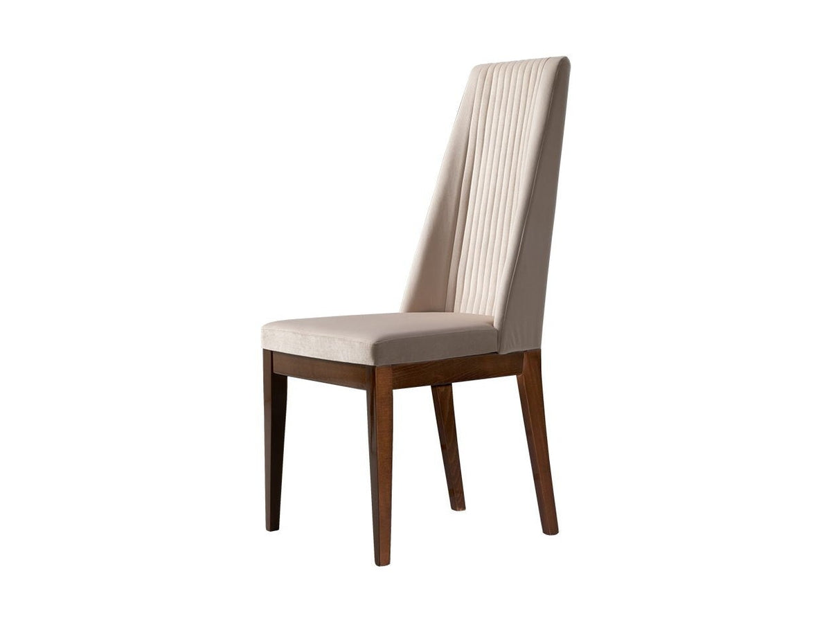 A modern dining chair with a tall, vertically ribbed upholstered backrest and a padded seat, supported by four tapered dark brown wooden legs, shown against a plain white background.