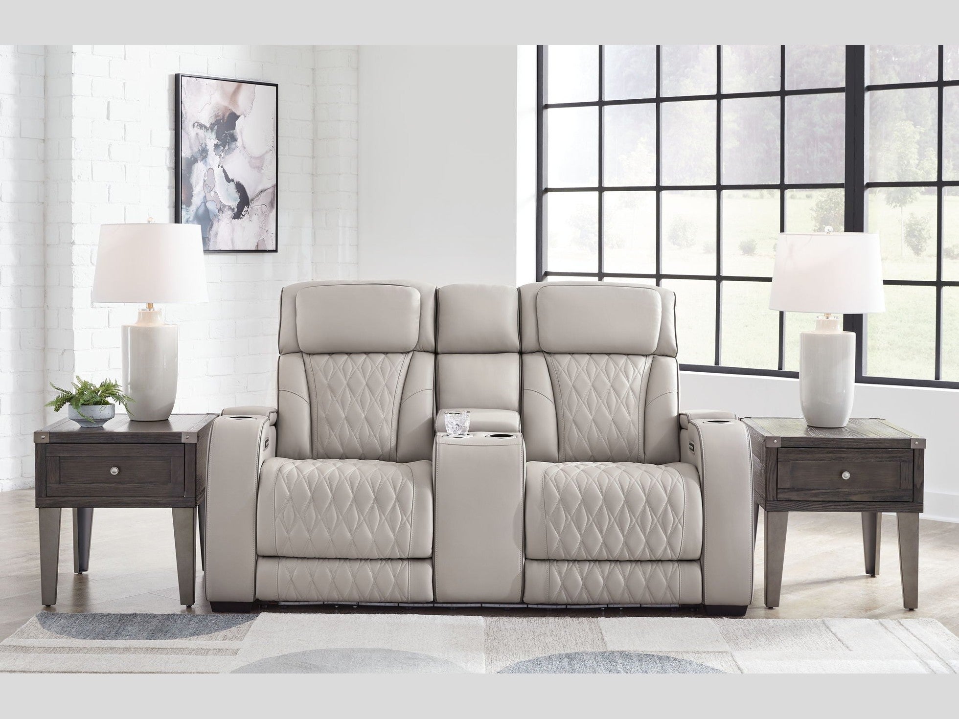 Boyington - Power Reclining Loveseat With Console/Adj Hdrst