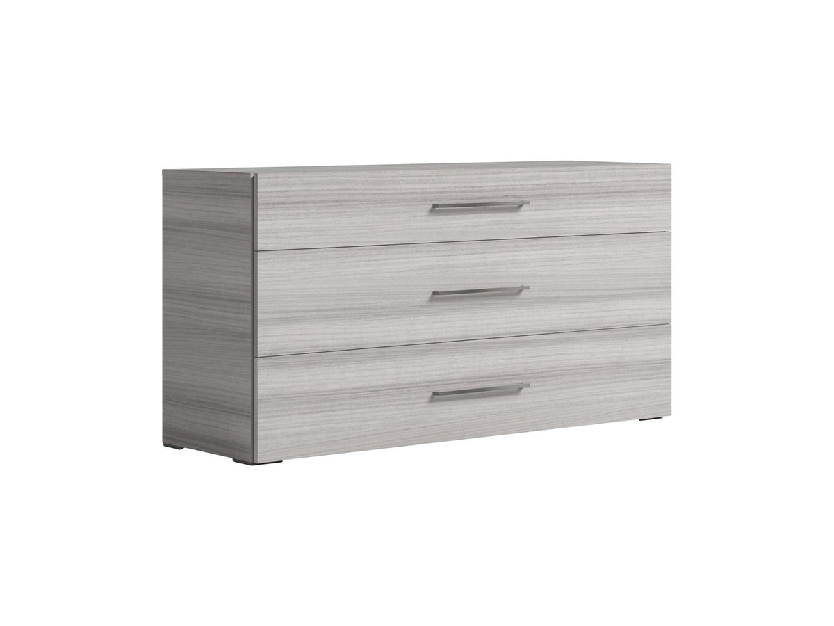A three-drawer dresser with a light gray wood grain finish and slim horizontal metal handles, shown on a plain white background.
