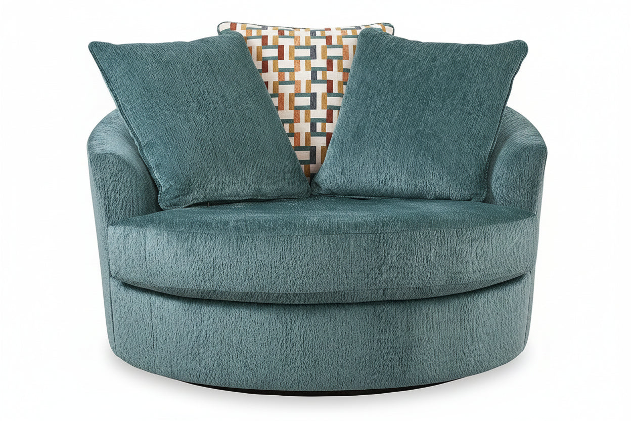 Blue swivel chair with patterned pillow on a white background