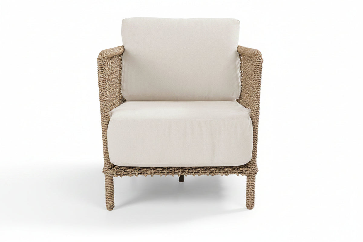 Chair with woven frame and white cushion on a white background