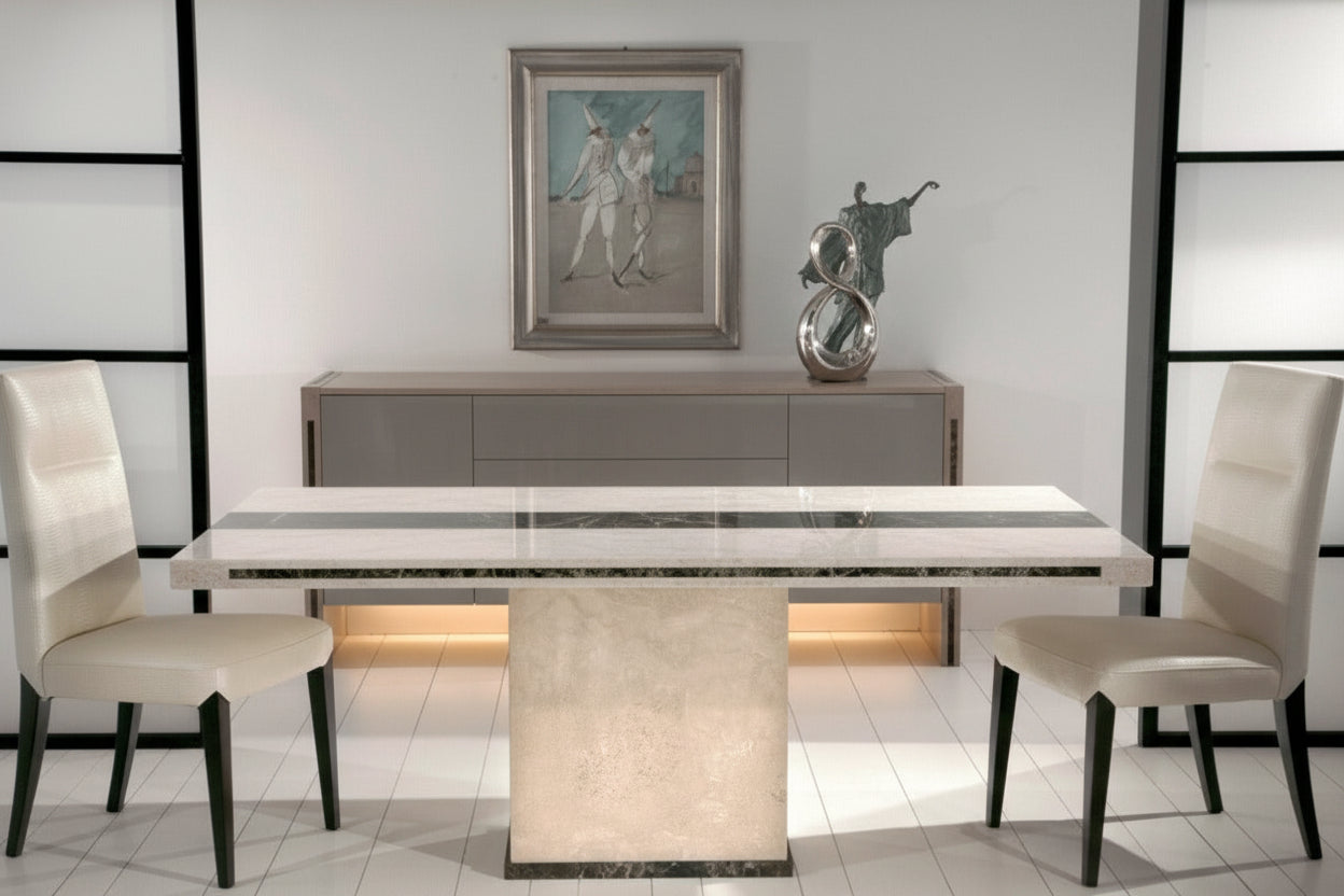 Dining room with a beige table and chairs, sideboard, and wall art.