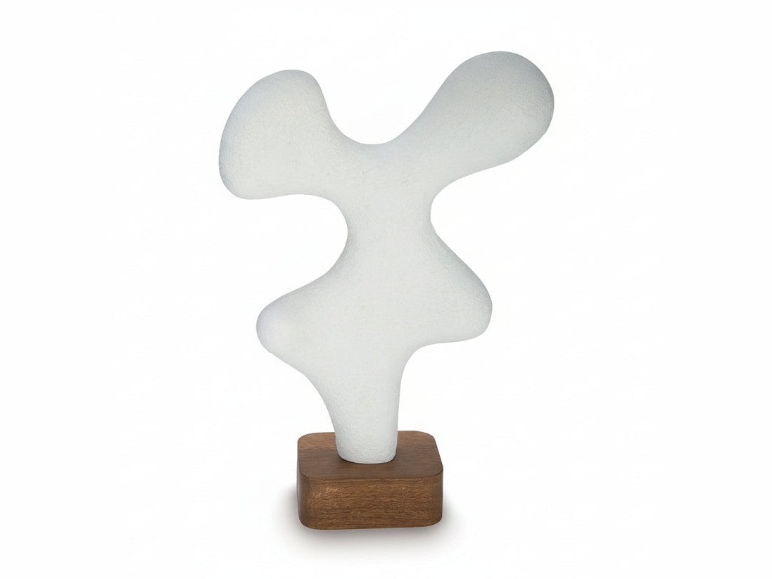Lavarsen abstract white sculpture on a wooden base against a white background.