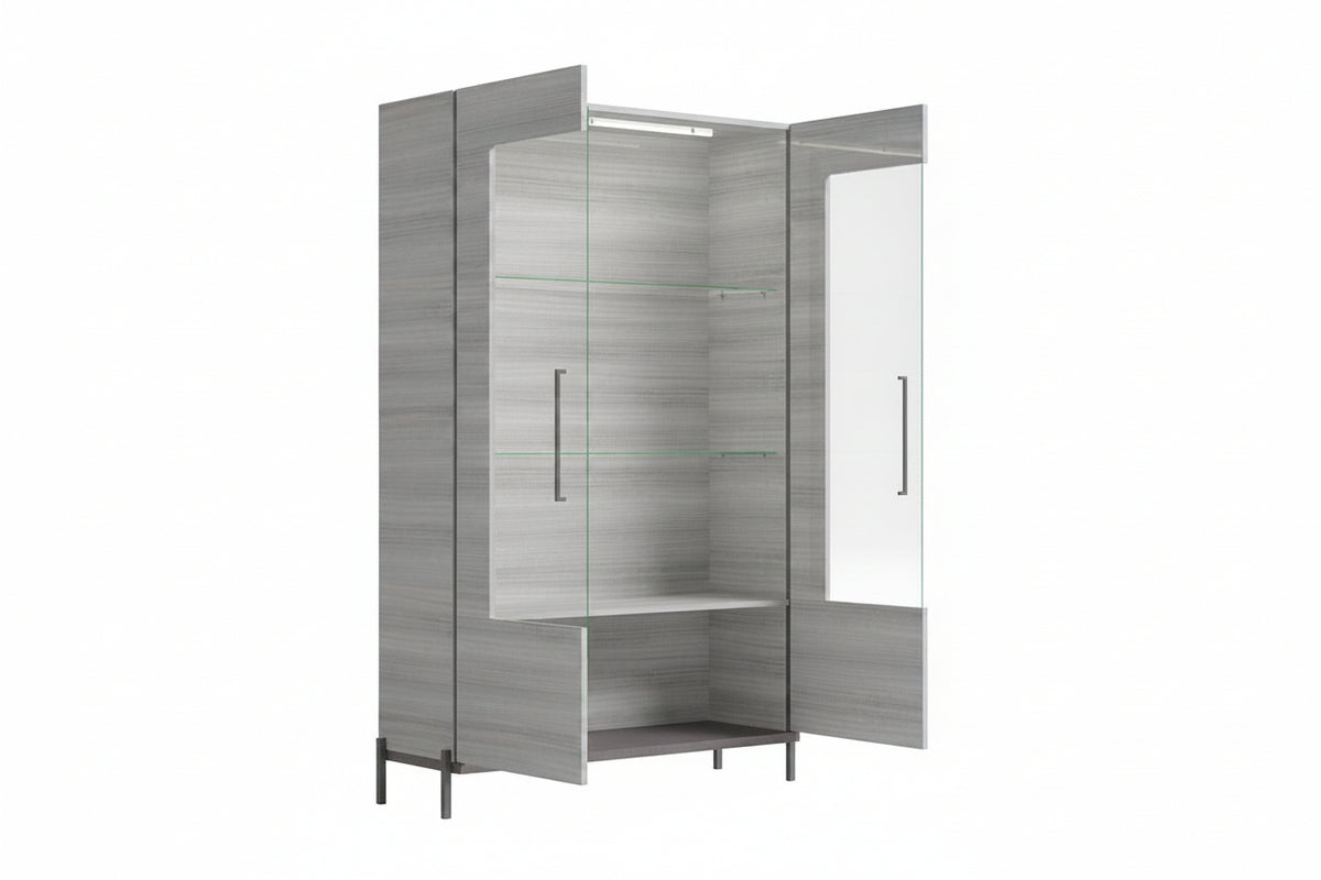 A modern walk-in closet organizer with a gray wood-grain finish, featuring two glass doors with slim black handles, three interior glass shelves, and a built-in mirror on the right door.