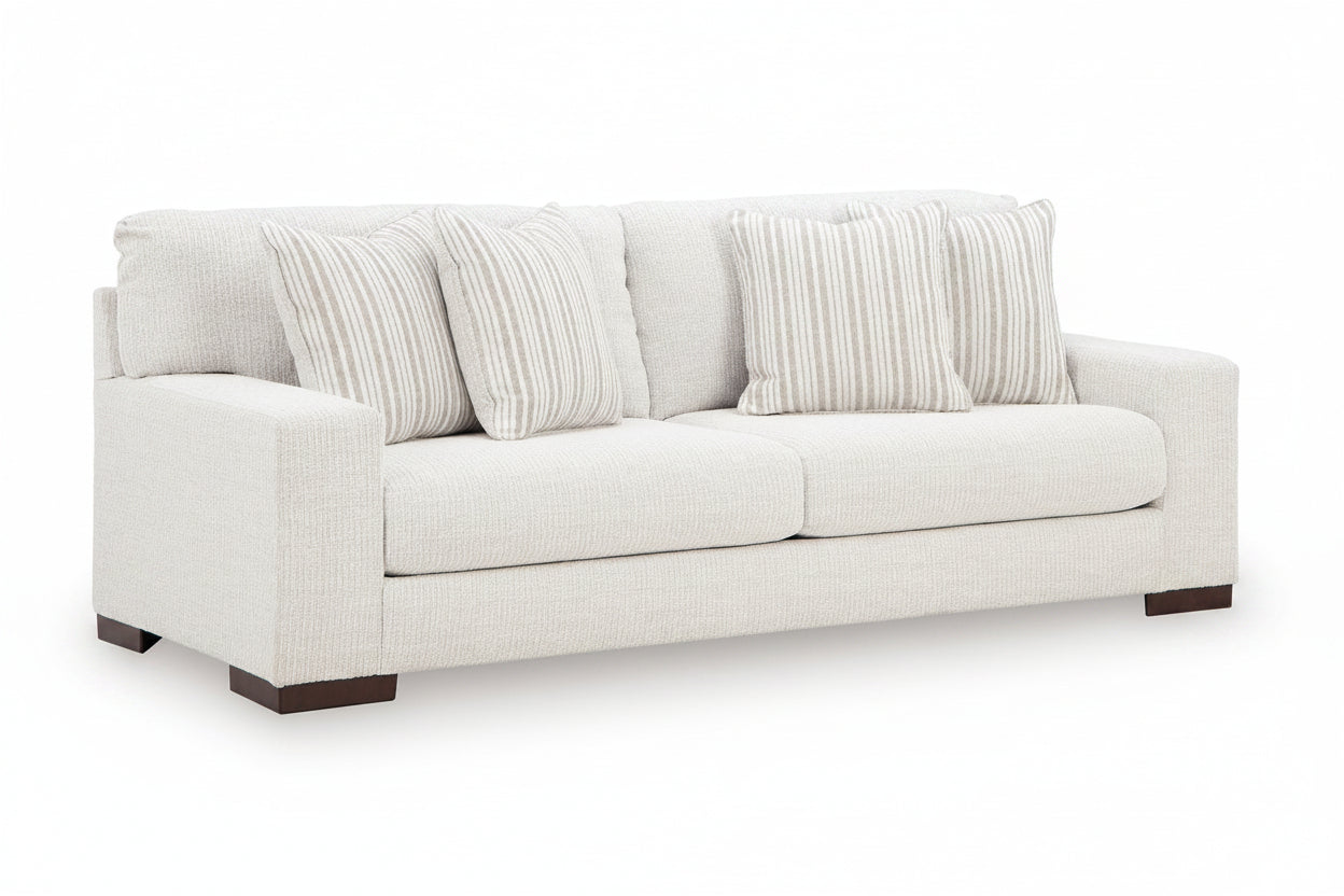 Hartside beige sofa with striped cushions on a white background.