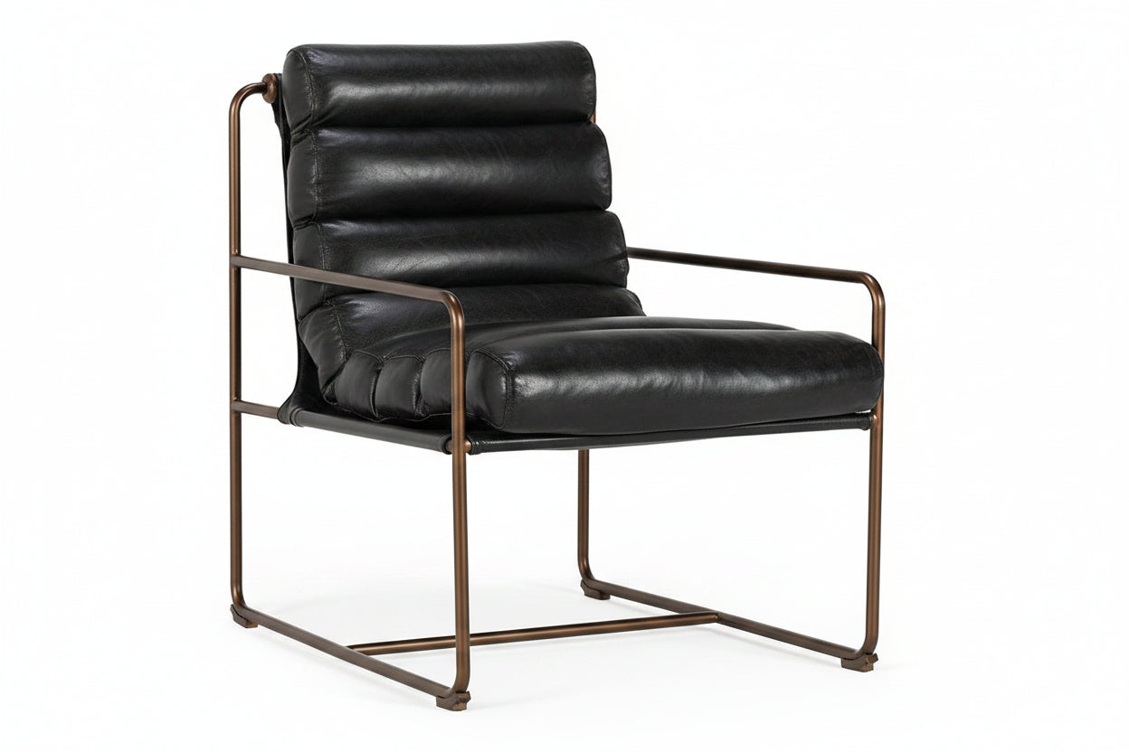 Black leather armchair with bronze frame on a white background
