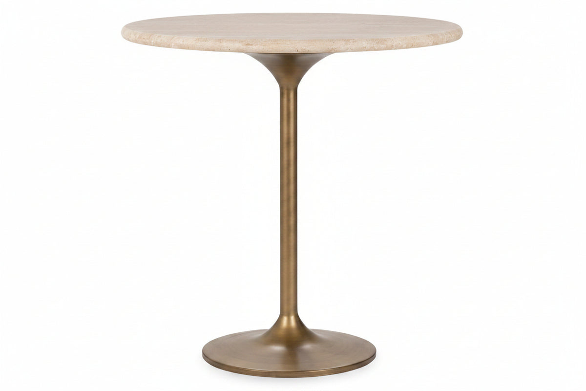 Round table with marble top and brass base on a white background