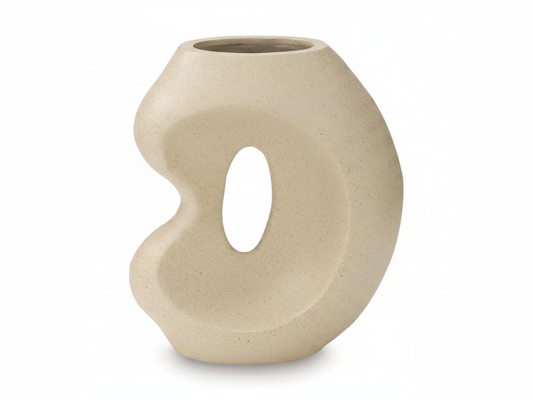 Odion beige ceramic vase with a circular hole on a white background