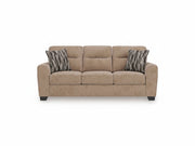 Olten beige sofa with patterned cushions on a white background.