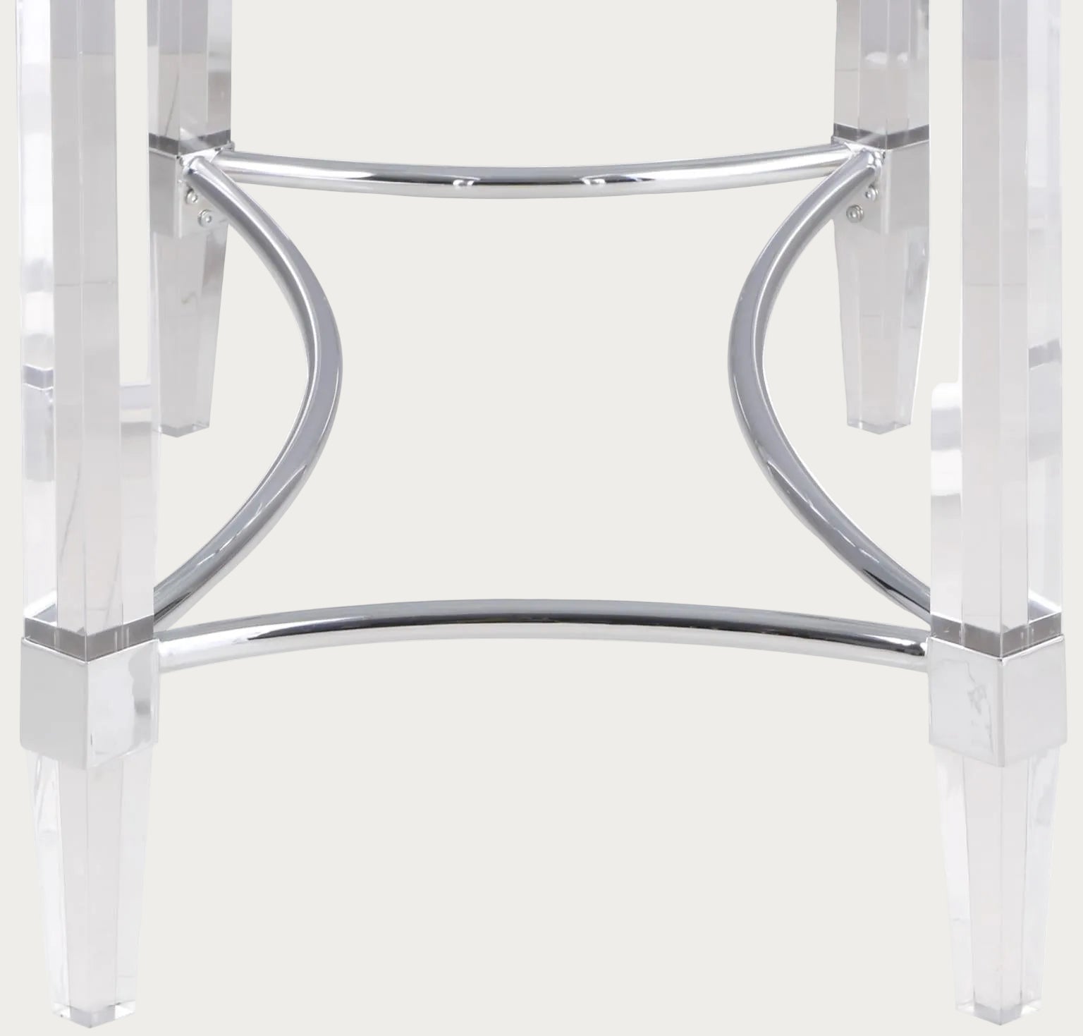 Clear acrylic stool with chrome accents on a white background