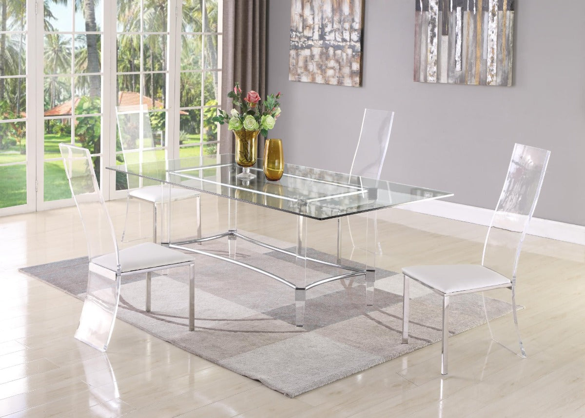 4038 dining table with four Layla chairs in a bright room with large windows.